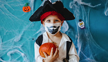 a child in a pirate costume